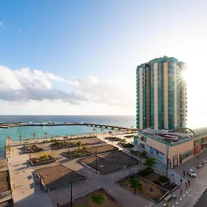 https://first-line-luxury-apartment.puertodelcarmen-hotels.org